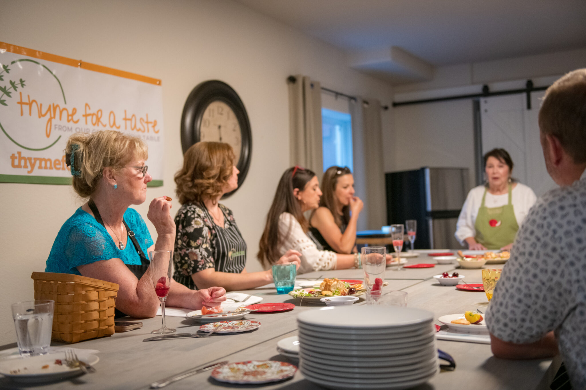 An evening at the Barn at Grace Hill Farmette, guests around a long table